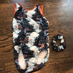 plum gymnastics leotard with matching scrunchie